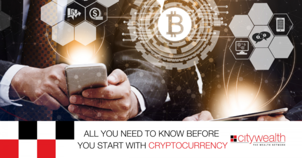 person with phone checking their crypto wallet and bitcoin price