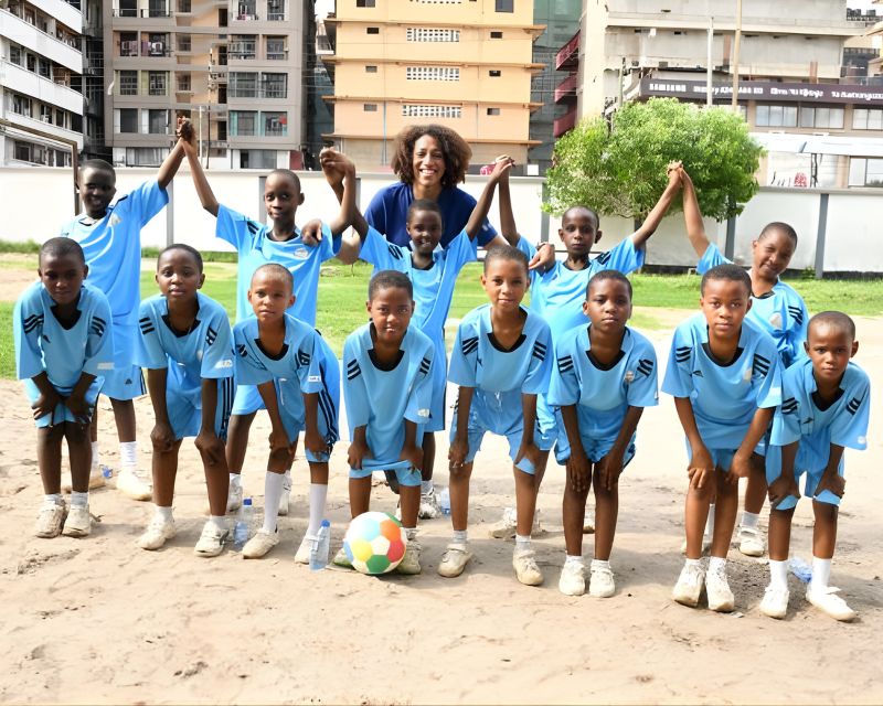 Picture of Carine N’Koué with kids