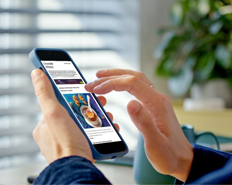 Picture of mobile and newsletter